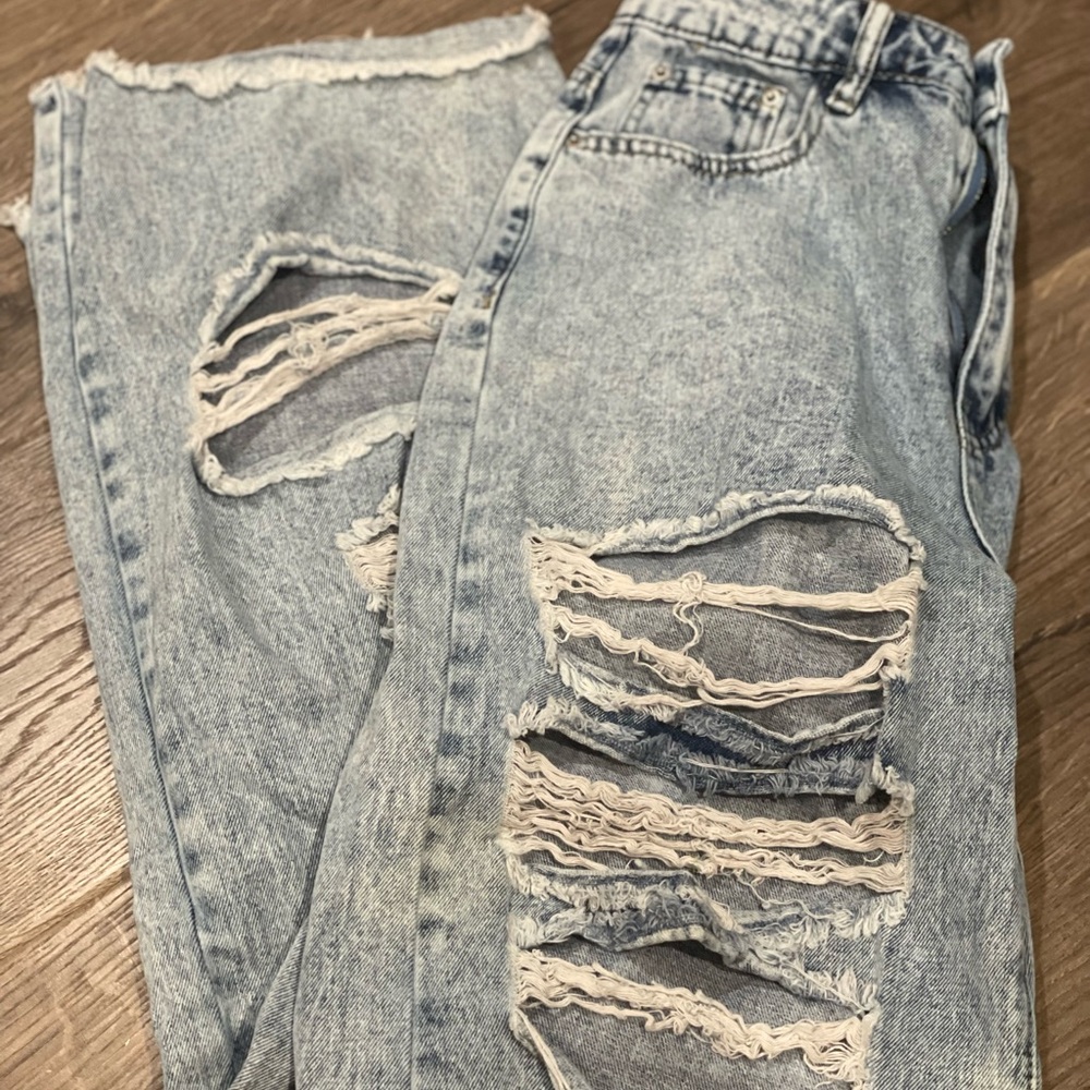 Distressed Light Blue Jeans